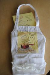 "Cook Your Way Through The S.A.T." author Charis Freiman-Mendel, the S.A.T. gourmet, photo of her book and matching apron for contest offered to middle school and high school students cosponsored with School Library Journal Teen S.L.J. Teen